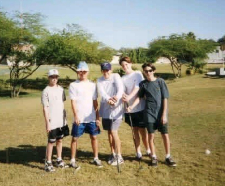 The founders and friends as teenagers playing an early version of Park Ball Golf in a park in Saudi Arabia